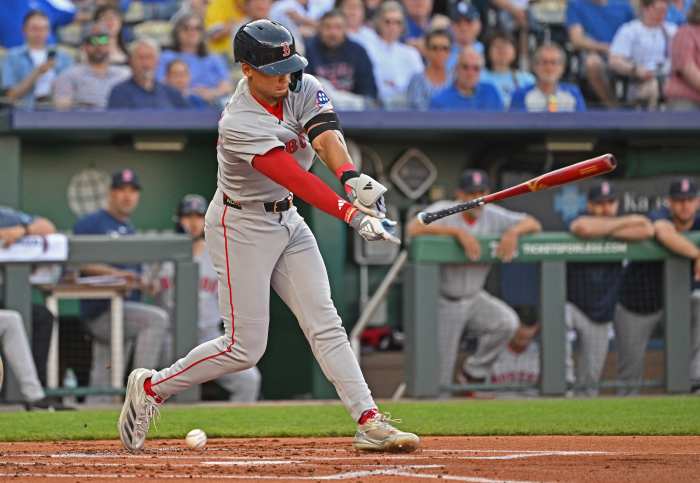 Boston Red Sox second baseman Kristian Campbell (28) losses his bat swinging at a pitch in the first inning against the Kansas City Royals at Kauffman Stadium.