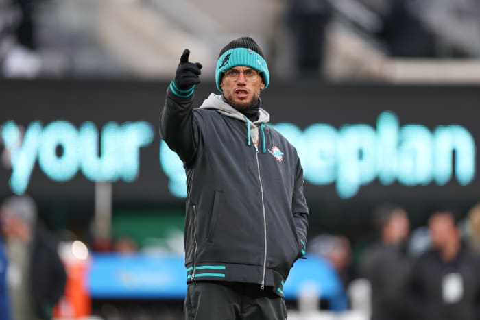 Jan 5, 2025; East Rutherford, New Jersey, USA; Miami Dolphins head coach Mike McDaniel on the field before the game against the New York Jets at MetLife Stadium.