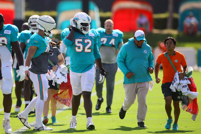 Miami Dolphins offensive tackle Patrick Paul (52) walks on the field during joint practice with the Washington Commanders at Baptist Health Training Complex.