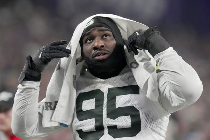 Green Bay Packers defensive tackle Devonte Wyatt (95) heads to the locker room during the third quarter against the Minnesota Vikings