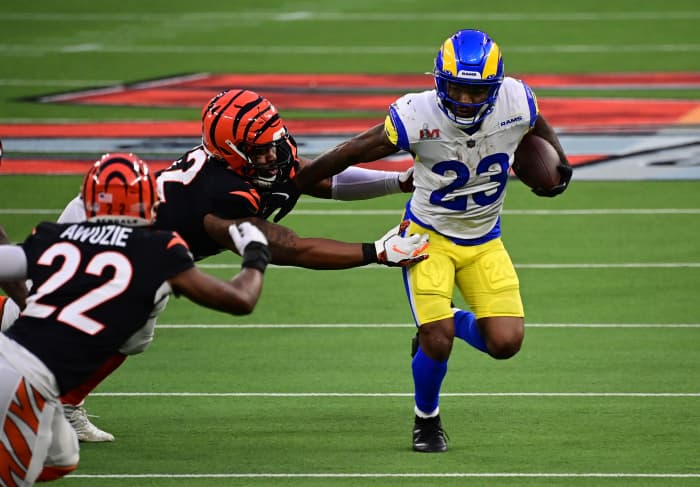 Los Angeles Rams running back Cam Akers (23) runs the ball against the Cincinnati Bengals in Super Bowl LVI. Mandatory Credit: Gary A. Vasquez-Imagn Images