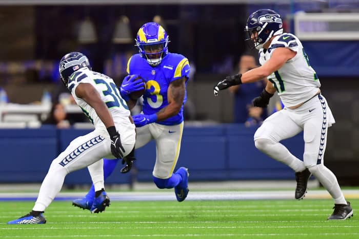 Los Angeles Rams running back Cam Akers (3) runs the ball against the Seattle Seahawks. Mandatory Credit: Gary A. Vasquez-Imagn Images