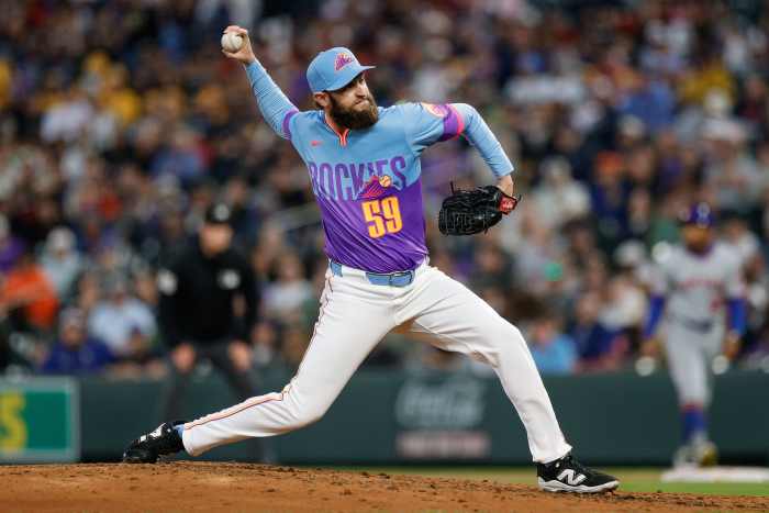 Jun 6, 2025; Denver, Colorado, USA; Colorado Rockies relief pitcher Jake Bird (59) pitches in the sixth inning against the New York Mets at Coors Field.