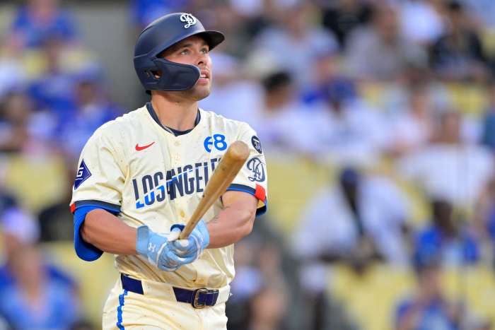 Los Angeles Dodgers catcher Dalton Rushing (68) hits a three-run home run in the eighth inning against the New York Yankees at Dodger Stadium.