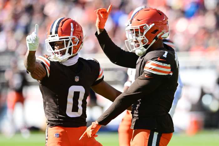 Cleveland Browns CB Greg Newsome II (0) and S Juan Thornhill (1) celebrate after a pass break up during the first half against the Baltimore Ravens.