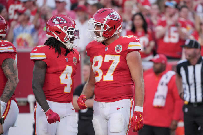 Kansas City Chiefs tight end Travis Kelce (87) celebrates with wide receiver Rashee Rice (4)