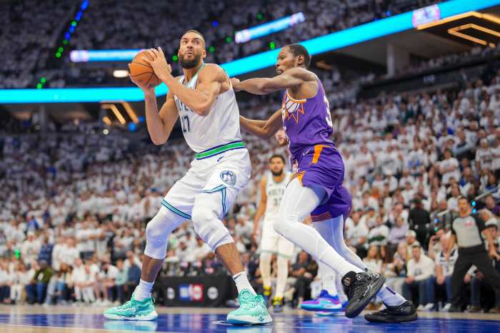 Phoenix Suns forward Kevin Durant (35) defends against Minnesota Timberwolves center Rudy Gobert (27) in the fourth quarter during game two of the first round for the 2024 NBA playoffs at Target Center.