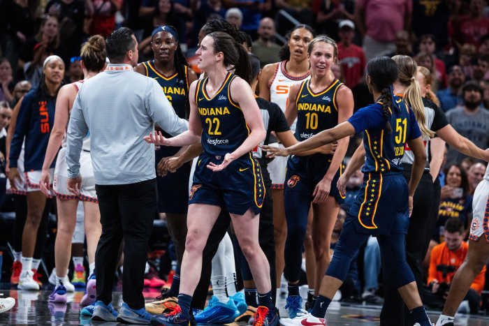 Indiana Fever guard Caitlin Clark (22) reacts during the game against the Connecticut Sun.