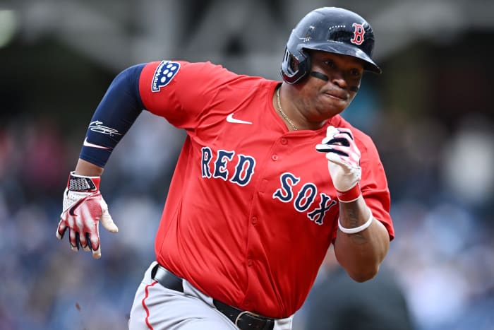 Boston Red Sox designated hitter Rafael Devers (11) rounds third base en route to scoring during the first inning against the Cleveland Guardians at Progressive Field.
