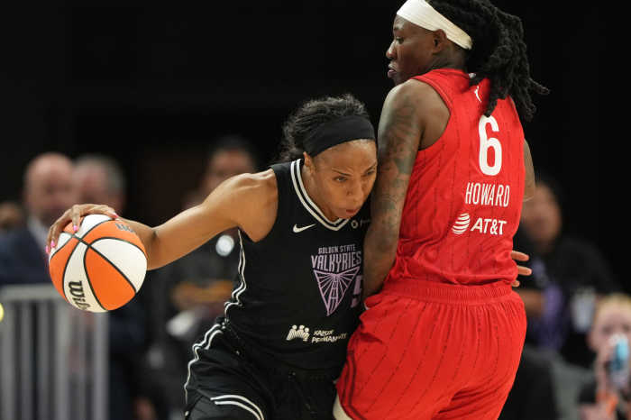 Golden State Valkyries forward Kayla Thornton (left) dribbles against Indiana Fever forward Natasha Howard (6).