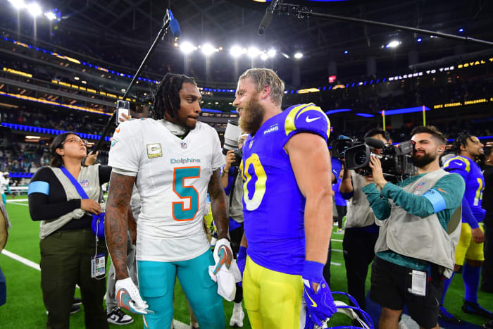 Miami Dolphins cornerback Jalen Ramsey (5) meets with Los Angeles Rams wide receiver Cooper Kupp (10) following the game at SoFi Stadium.