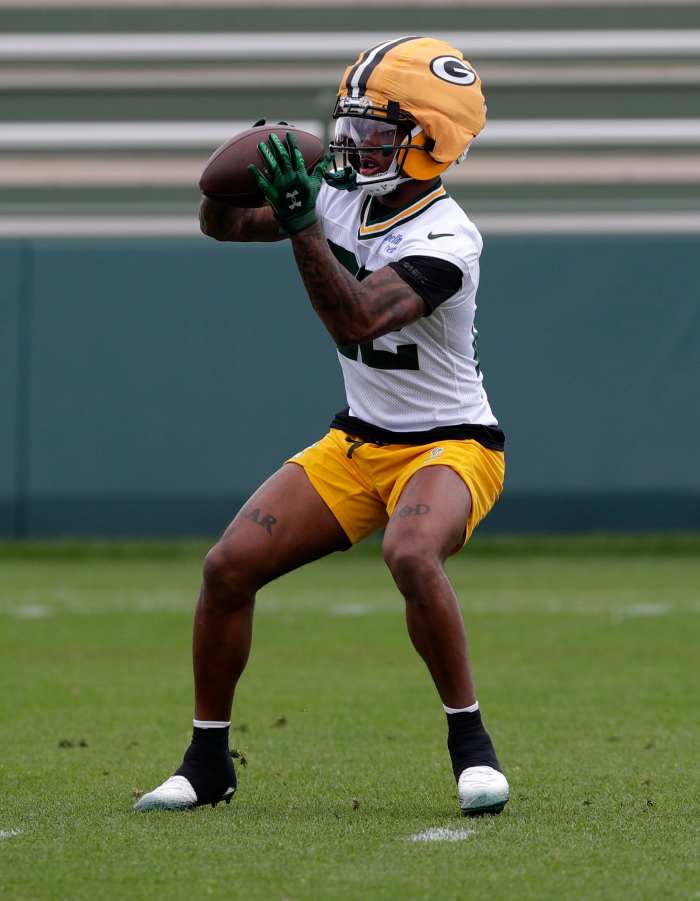Packers rookie Matthew Golden catches a pass at minicamp.