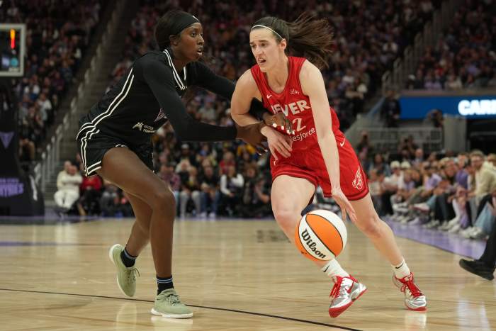 Caitlin Clark drives the lane vs. Golden State.