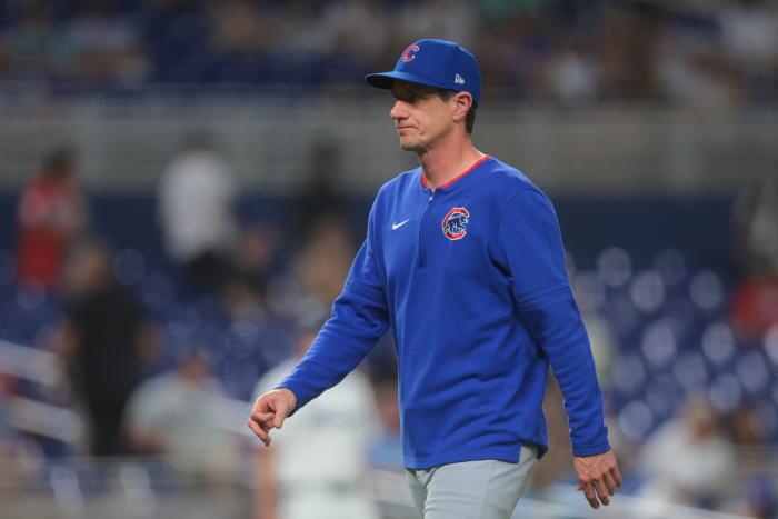 Chicago Cubs manager Craig Counsell (11) returns to the dugout after a pitching change against the Miami Marlins during the fifth inning at loanDepot Park.