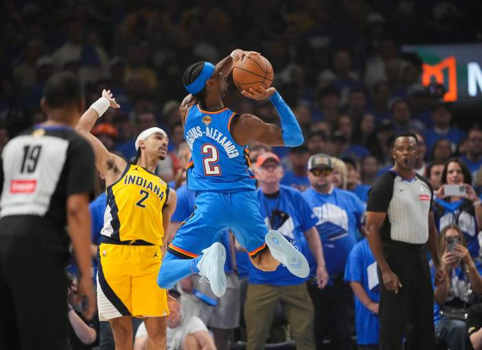 Oklahoma City Thunder guard Shai Gilgeous-Alexander rises to attempt a shot as Indiana Pacers guard Andrew Nembhard defends during Game 7 of the 2025 NBA Finals at Paycom Center on June 22, 2025.