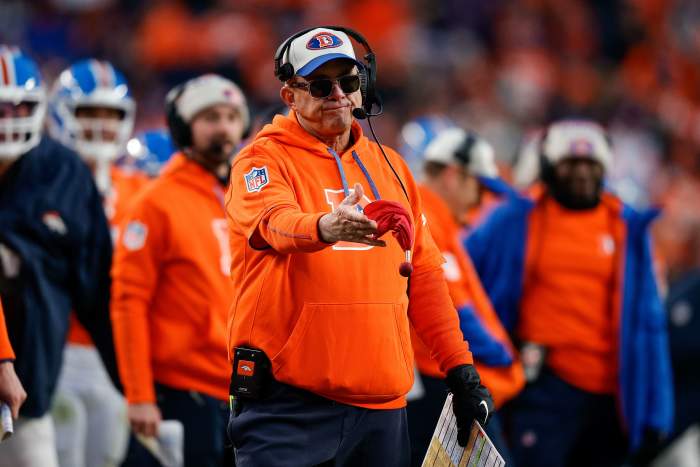 Denver Broncos head coach Sean Payton challenges a call in the fourth quarter against the Kansas City Chiefs at Empower Field at Mile High.