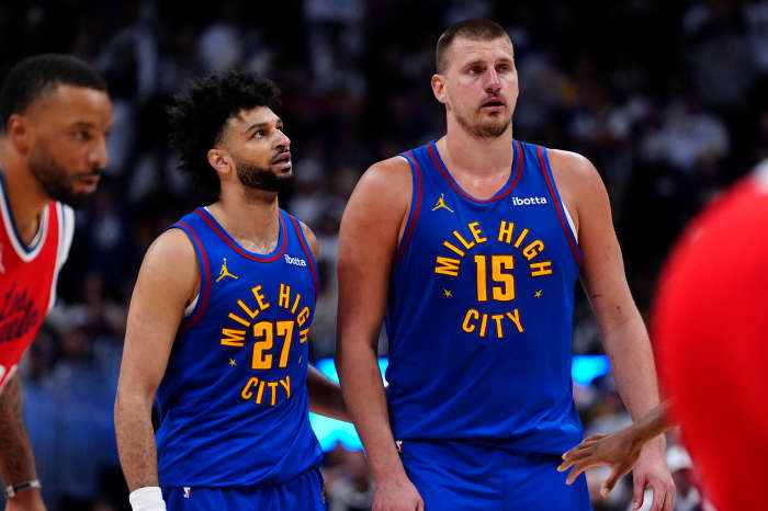 Denver Nuggets center Nikola Jokic (15) and Denver Nuggets guard Jamal Murray (27).