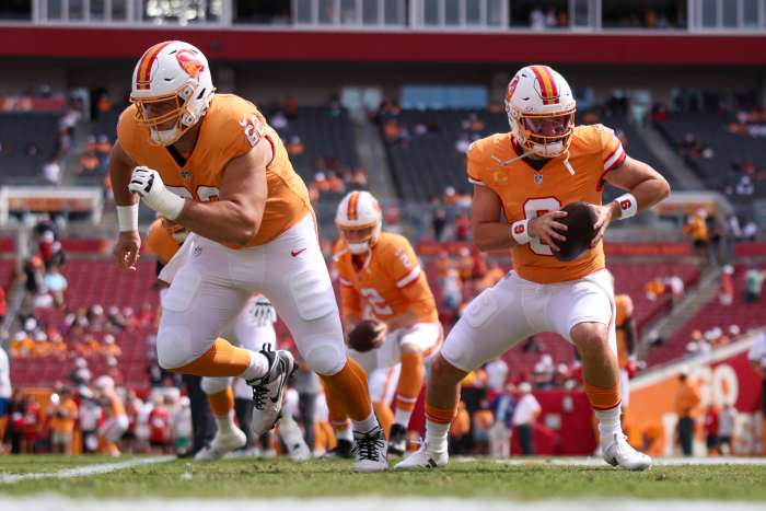 Oct 27, 2024; Tampa, Florida, USA; Tampa Bay Buccaneers quarterback Baker Mayfield (6) and center Graham Barton (62) warm up before a game against the Atlanta Falcons at Raymond James Stadium.