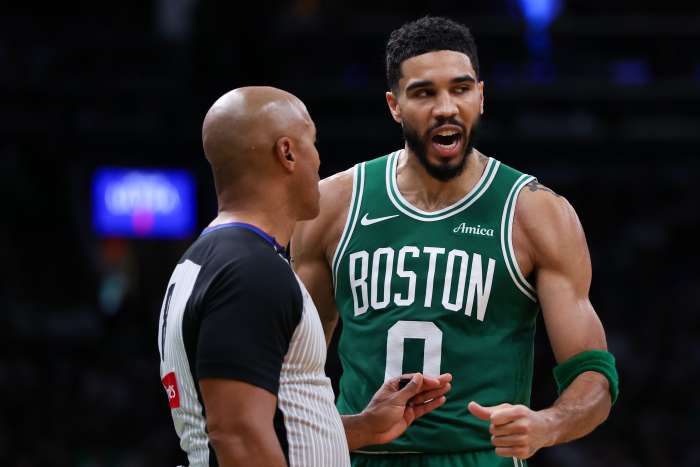 Celtics forward Jayson Tatum argues with the referee.