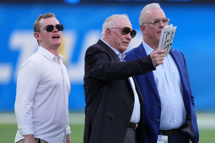 Aug 20, 2022; Inglewood, California, USA; Dallas Cowboys cowboys owner Jerry Jones, center, stands on the field with his son Stephen Jones and grandson Shy Anderson Jr. during the game against the Los Angeles Chargers at SoFi Stadium. Mandatory Credit: Kirby Lee-Imagn Images