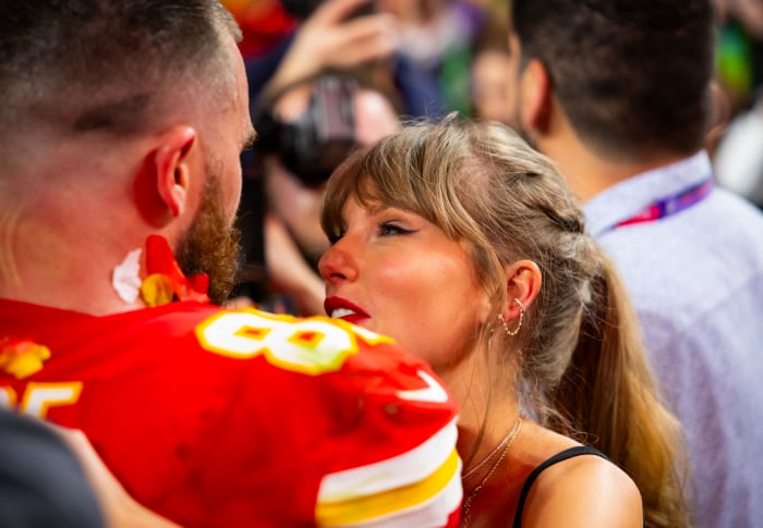 Chiefs tight end Travis Kelce celebrates the 2024 Super Bowl win with girlfriend Taylor Swift at Allegiant Stadium.
