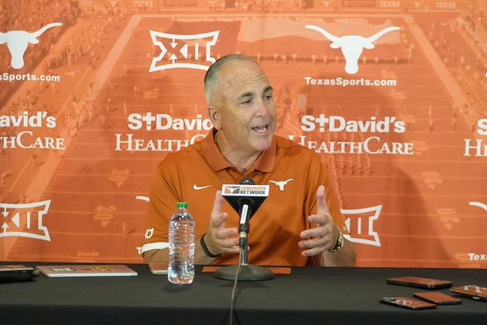 Longhorns Offensive coordinator Kyle Flood answer questions from the local news media during the first press conferences for the 2023 football season on August 1, 2023.