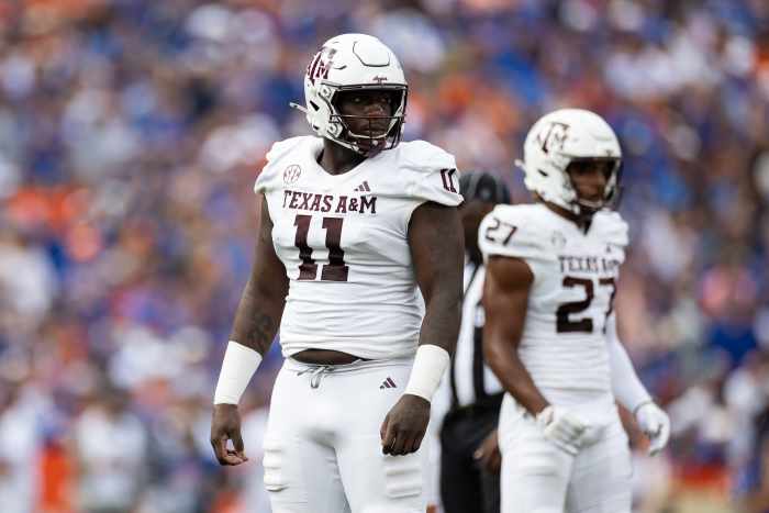 Sep 14, 2024; Gainesville, Florida, USA; Texas A&M Aggies defensive lineman Nic Scourton (11) looks toward the sideline against the Florida Gators during the first half at Ben Hill Griffin Stadium.