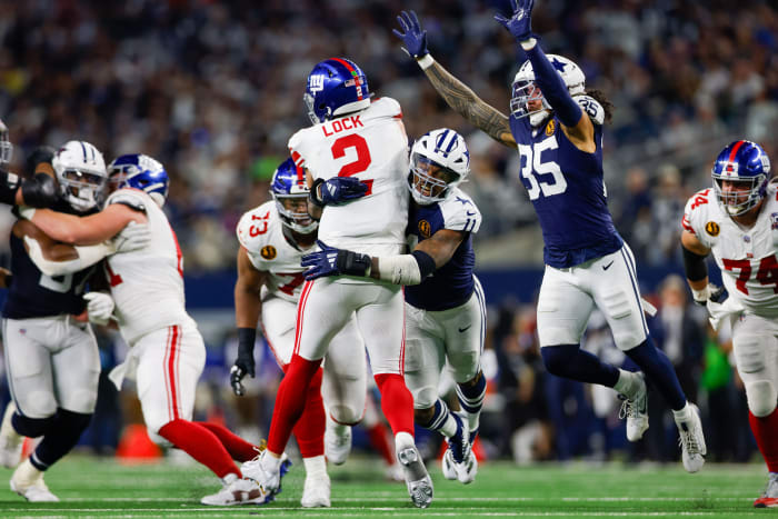 New York Giants quarterback Drew Lock (2) is sacked by Dallas Cowboys linebacker Micah Parsons (11)