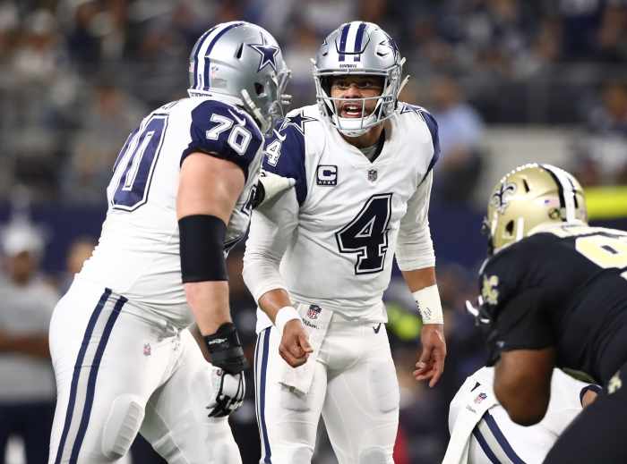 Dallas Cowboys quarterback Dak Prescott and Zack Martin.