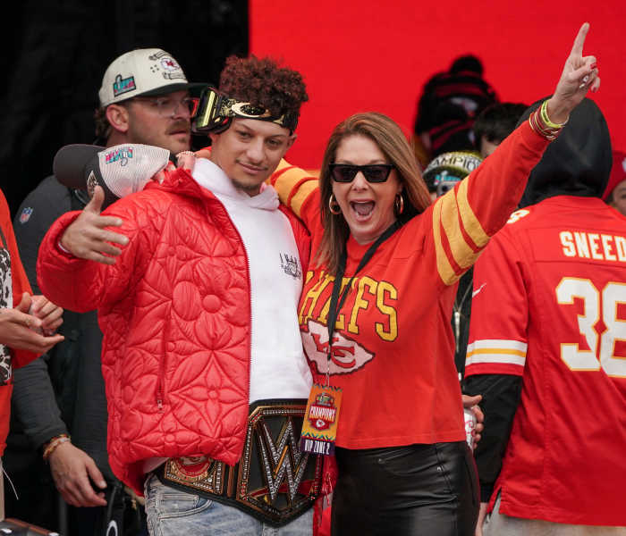 Kansas City Chiefs quarterback Patrick Mahomes (15) celebrates with his mother Randi Martin during the Kansas City Chiefs Super Bowl parade.