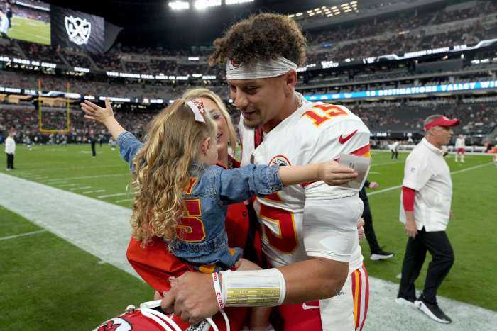 Kansas City Chiefs quarterback Patrick Mahomes (15) interacts with wife Brittany Mahomes and daughter Sterling Mahomes.