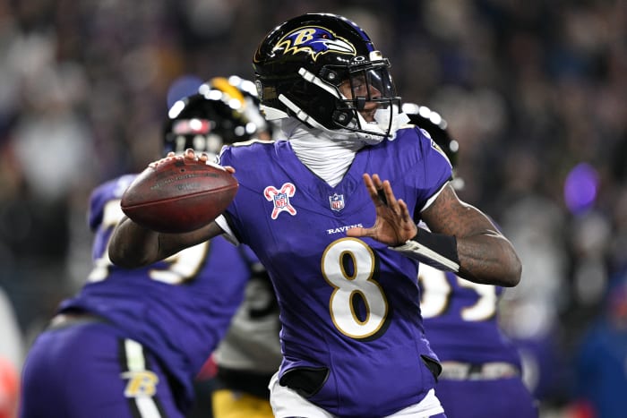 Lamar Jackson (8) throws from the pocket during the second half against the Steelers.