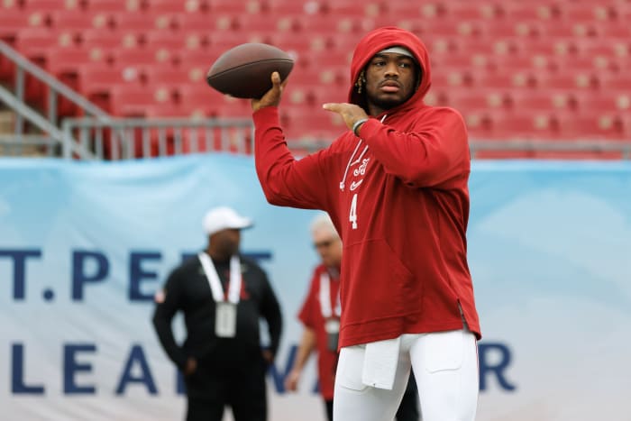 Jalen Milroe's Pregame Embrace With Alabama Staffer Turns Heads ...