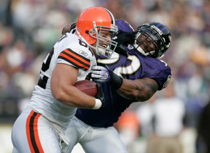 Dec 17, 2006; Baltimore, MD, USA; Cleveland Browns tight end (82) Steve Heiden stiff-arms Baltimore Ravens linebacker (52) Ray Lewis during a run after catch in the first quarter at M&T Bank Stadium in Baltimore, MD.