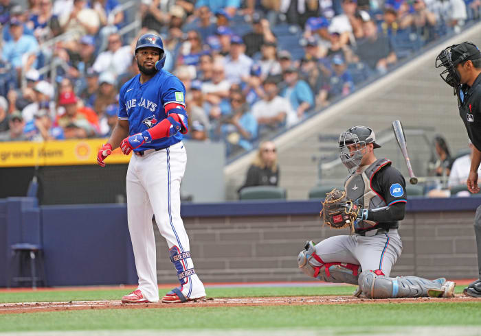 Toronto Blue Jays designated hitter Vladimir Guerrero Jr. flips his bat after being walked against