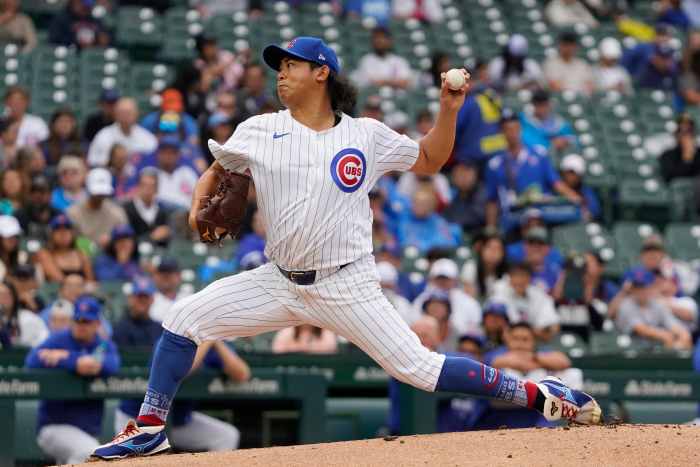 Chicago Cubs pitcher Shota Imanaga throws the ball against the Washington Nationals.