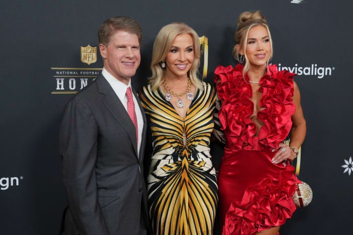 Kansas City Chiefs owner Clark Hunt (left) with his wife Tavia Shackles (center) and daughter Gracie Hunt (right).