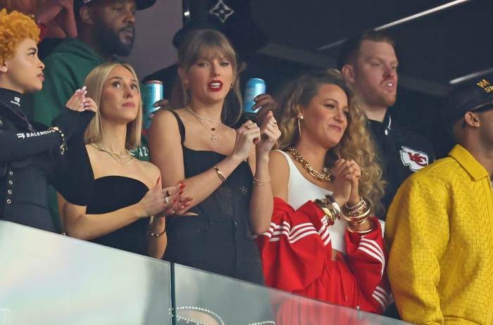 Pop star Taylor Swift and actress Blake Lively, right, attend Super Bowl LVIII between the Kansas City Chiefs and the San Francisco 49ers.