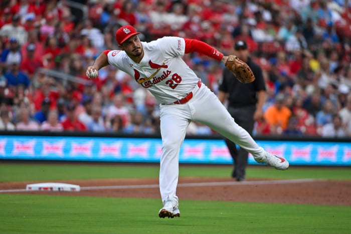 Jul 10, 2024; St. Louis, Missouri, USA; St. Louis Cardinals third baseman Nolan Arenado (28) throws on the run against the Kansas City Royals during the third inning at Busch Stadium.