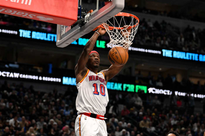Golden State Warriors forward Jimmy Butler dunks during a game against the Dallas Mavericks.