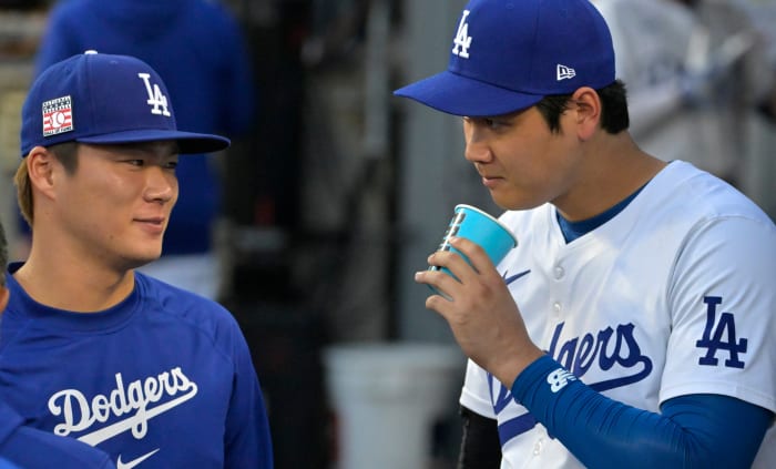 Los Angeles Dodgers starting pitcher Yoshinobu Yamamoto (18) teammate Shohei Ohtani