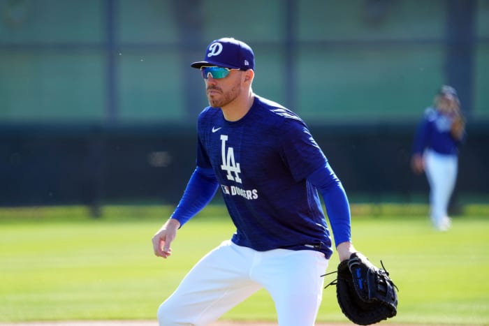 Los Angeles Dodgers first base Freddie Freeman (5) performs a drill during a Spring Training workout at Camelback Ranch.