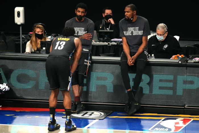 Former Brooklyn Nets players Kyrie Irving, Kevin Durant and James Harden