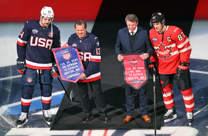 Team USA forward Auston Matthews, former hockey player Mike Eruzione, former hockey player Wayne Gretzky and Team Canada forward Sidney Crosby during the 4 Nations Face-Off.