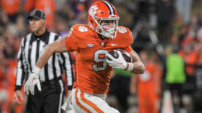 Clemson Tigers tight end Jake Briningstool (9) runs after a catch against the Miami Hurricanes during the fourth quarter at Memorial Stadium.