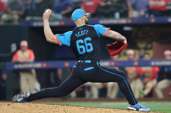 National League pitcher Tanner Scott of the Miami Marlins (66) pitches in the eighth inning during the 2024 MLB All-Star game at Globe Life Field.