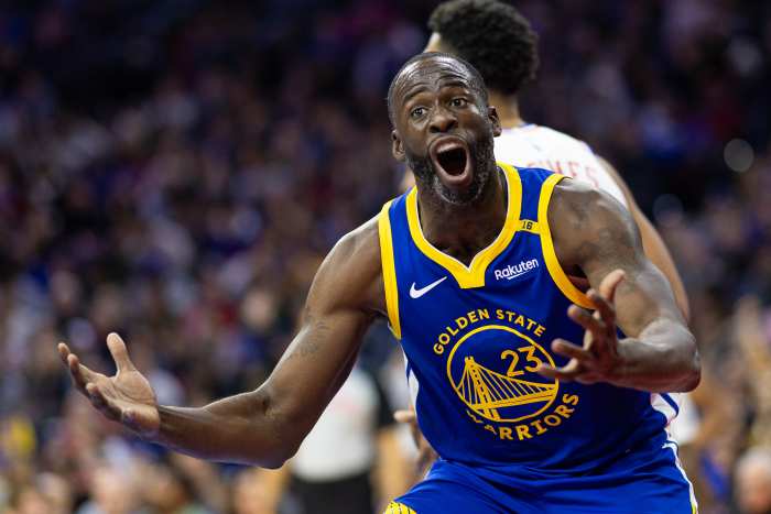 Golden State Warriors forward Draymond Green (23) reacts during a game.