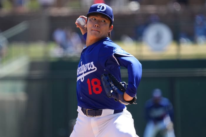 Los Angeles Dodgers pitcher Yoshinobu Yamamoto (18) pitches against the Arizona Diamondbacks during the second inning at Camelback Ranch-Glendale.