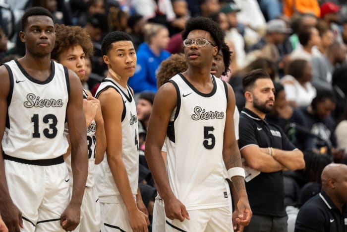 Sierra Canyon’s Bryce James (5), the son of NBA player LeBron James, stands with his teammates by the bench before the game between Sierra Canyon and Bartlett High School during Memphis Hoopfest in Eads, Tenn., on Friday, January 3, 2025.  
