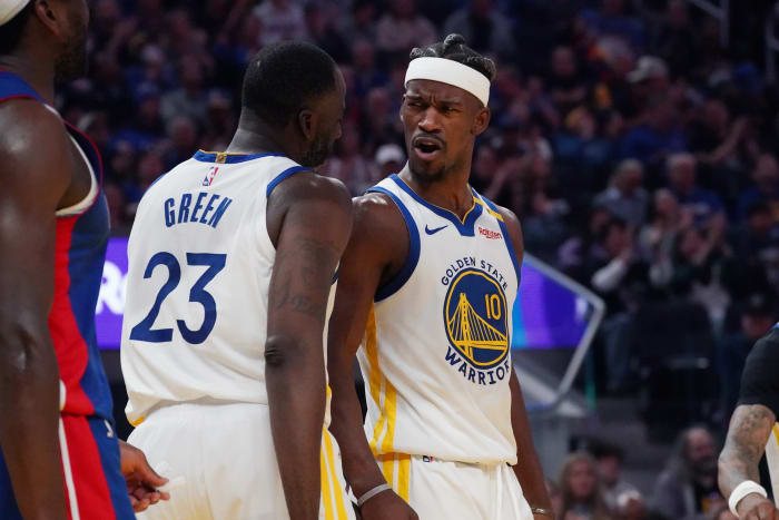 Golden State Warriors forwards Jimmy Butler III (10) and Draymond Green (23)
